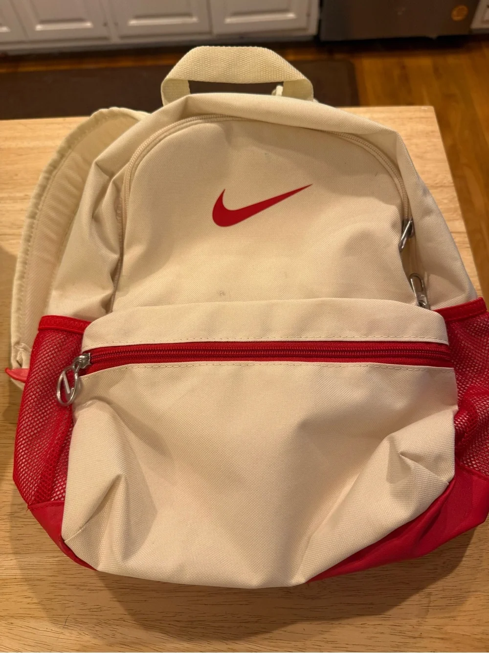 Nike Cream and Red Mini Backpack with Swoosh
